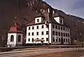 Station with Herrenhaus Grafenort in the background (2004)