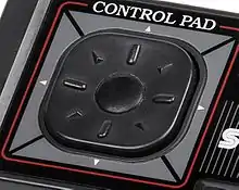 Close-up view of Sega Master System D-pad, shaped like a rounded rectangle