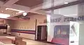 Looking through the front entrance windows of the vacant St. Charles Mall after closure. (Second set of doors)