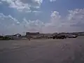 Demolition underway at the St. Charles Mall on May 30, 2002. (Parking lot perspective)