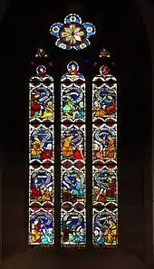 Stained glass window "Virtues fighting vices"