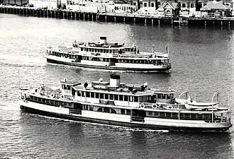 "Sisters" Karrabee (near) and Karingal in Sydney Cove, 1950s.