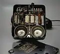 Image 5Rotary dial telephone, probably from Belgium; the circuit diagram inside is in Dutch and French