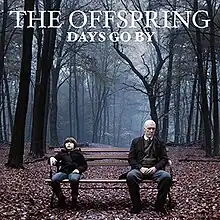 The album cover depicts a boy sitting on a bench in a forest on the right side looking up alongside an old man (which could be the boy in the future) on the left side. The words "The Offspring" and "Days Go By" are on the top and are in capital letters.