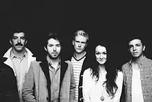 The Paper Kites in 2012.  L–R: Dave Powys, Sam Bentley, Sam Rasmussen, Christina Lacy, Josh Bentley