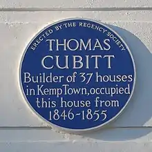 Blue plaque commemorating Thomas Cubitt's residence at 13 Lewes Crescent