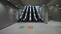 A set of escalators mono-directionally upwards, at the transfer passage from Line 18 to Line 16