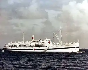 USS Relief (AH-1) in a western Pacific harbour, circa in April 1945