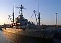 The rescue and salvage ship USS Grapple (ARS 53), prepares to get underway for salvage and diving operations in the aftermath of Hurricane Katrina.
