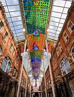 The street-length canopy of Victoria Quarter, Leeds, the largest stained glass work in Great Britain
