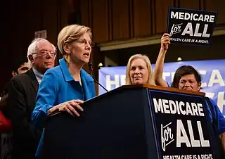 Image 21Elizabeth Warren and Bernie Sanders campaigning for extended US medicare coverage in 2017.  (from Health politics)