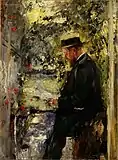 Veterinarian Dr. Reindl in the arbor, c. 1890