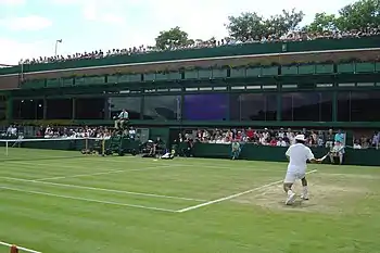 Image 26Sébastien Grosjean takes a shot on Court 18 during the 2004 Championships. (from Wimbledon Championships)