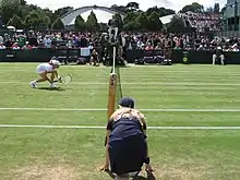 Image 61Wimbledon ball girl at the net, 2007. (from Wimbledon Championships)