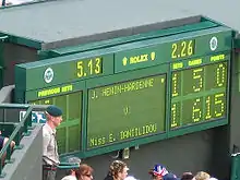 Image 47A Royal Marines Commando as a services steward in 2005. (from Wimbledon Championships)